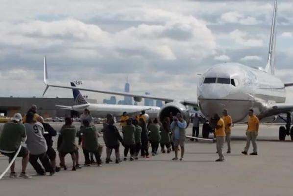 Teams Compete In Jetliner Tug-of-war At Newark Airport