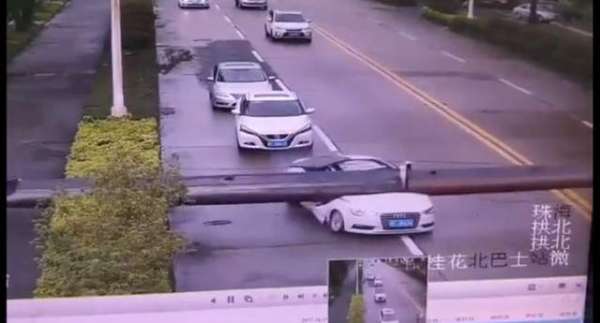 Audi Driver Somehow Cheats Death After Massive Crane Arm Falls On His Car